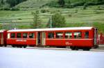 RhB - B 2328 am 06.06.1992 in Scuol - 2.Klasse Personenwagen - Mitteleinstiegswagen mittelschwerer Stahlbauart - bernahme: 20.05.1948 - SWS - Fahrzeuggewicht 21,00t - Sitzpltze 64 - LP 17,63m - zulssige Geschwindigkeit 90 km/h - 2=20.07.1990 - Logo RhB in rtoromanisch. Hinweis: Klassezahlen klein, flacher Anschriftenblock, schlanke Betriebsnummern, ohne Kennzeichnung an den Ecken - die Fahrzeugserie bestand aus 13 Wagen mit den Nummern 2321 bis 2333. 
