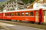 RhB - B 2354 am 01.10.1990 in Disentis - 2.Klasse Einheitspersonenwagen (Typ 1) - bernahme 20.07.1964 - FFA/SIG/RhB - Fahrzeuggewicht 18,00t - Sitzpltze 64 - LP 18,42m - zulssige Geschwindigkeit 90 km/h - Logo RhB in deutsch - 2=21.09.1989 - Lebenslauf: ex B4 2354 - 1964 B 2354 - Hinweis: Klassezahlen klein, hoher Anschriftenblock, schlanke Betriebsnummern, mit Griffstangen neben den Tren - ohne Kennzeichnung an den Ecken - die Fahrzeugserie besteht aus 33 Wagen mit den Nummern 2341 bis 2373. 
