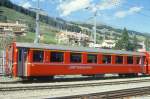 RhB - A 1228 am 09.09.1994 in Scuol - 1.Klasse Einheitspersonenwagen Typ I - bernahme 23.09.1965 - FFA/SIG - Fahrzeuggewicht 19,00t - Sitzpltze 36 - LP 18,42m - zulssige Geschwindigkeit 90 km/h - 3=13.12.1991 - Logo RhB in deutsch. Hinweis: mit gelben Hinweispfeile an den Tren fr Taster, Klassezahlen klein, hoher Anschriftenblock, dnne Betriebsnummern, gescanntes Dia
