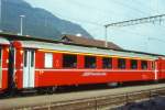 RhB - A 1228 am 06.09.1996 in Landquart - 1.Klasse Einheitspersonenwagen Typ I - bernahme 23.09.1965 - FFA/SIG - Fahrzeuggewicht 19,00t - Sitzpltze 36 - LP 18,42m - zulssige Geschwindigkeit 90 km/h - 3=13.12.1991 - Logo RhB in italienisch. Hinweis: Hinweispfeile an den Tren fr Taster entfernt, Klassezahlen klein, hoher Anschriftenblock, dnne Betriebsnummern, gescanntes Dia
