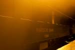 Vom Dampf leicht eingehüllter Schriftzug des historischen Rhb Personenwagen 3.Klasse aus dem Jahre 1932 am Zugende des Cla Ferovia Sonderzuges im Bahnhof Valendas.Bild vom 13.12.2015 
