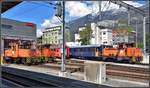 Die orange Seite der Kleinen Roten vereint vor dem Depot Chur. Ge 3/3 215, Gm 3/3 231 und 233 und der WR3810. (14.05.2019)