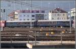 Zwei Speisewagen der Gourmino Swiss Alps (nach Schweizerischer Speisewagensellschaft und Elvetino werden die Namen immer abenteurlicher) abgestellt in Chur. (12.03.2007)