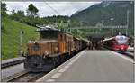 Fahrplanmässiger R1822 mit Ge 6/6 I 414 nach Davos Platz und IR1129 nach St.Moritz mit einem neuen Steuerwagen Ait 57801 am Zugschluss in Filisur. (16.06.2019)