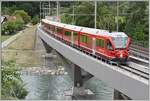 IR1145 nach St.Moritz mit Ge 4/4 III 644  Savognin  mit einem Set Alvra-Wagen und Steuerwagen Ait57805 auf der Hinterrheinbrücke bei Reichenau-Tamins. (13.05.2020)