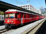 RhB - Regio nach Thusis mit dem Steuerwagen ABDt 1711 und B + B +  Be 4/4 515 im Bahnhof von Chur am 07.05.2009