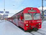 RhB - Steuerwagen BDt 1753 vor Regio bei der einfahrt im Bahnhof Samedan am 01.01.2010