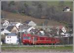 RE1040 mit Steuerwagen 1757 aus Davos bei Malans. (20.11.2010)