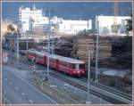 Ein Be 4/4 Pendelzug gefhrt vom Steuerwagen 1713 fhrt an den Ems Werken vorbei Richtung Reichenau-Tamins. (11.01.2007)