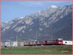 Regionalzug bei Chur West mit Montalin 2266m/.M.