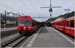 UNESCO Welterbetag bei der RhB. R1928 mit Steuerwagen 1753 nach Scuol-Tarasp neben RE1128/GEX903 in Samedan. (12.06.2016)