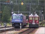 Die Stammnetzlok Ge 4/4 III 648  Susch  hat sich vom Bernina Express aus Chur abgekuppelt. Die Triebwagen 55 und 45 werden den Zug, nach Umschalten der Fahrleitungsspannung, bernehmen. (13.06.2007)