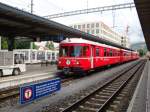 Triebwagen 1712 der Rhtischen Bahn steht als Regionalzug nach Thusis abfahrtbereit im Bahnhof Chur.