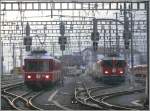 Im letzten Abendlicht erreicht die S2 1568 mit Be 4/4 513 den Bahnhof Chur. Nebenan macht sich Ge 4/4 II 619 Samedan mit einem Gterzug nach Landquart bereit. Auf diese Lok hatte ich es abgesehen, aber sie wollte einfach nicht kommen.... (21.01.2010)