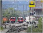 Station Untervaz-Trimmis mit Gm 4/4 241. Ge 6/6 II 703  St.Moritz  und Be 4/4 515. (04.05.2010)