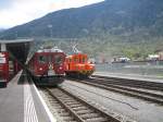 ABe 4/4 ll 47 der RhB in Tirano, links Ge 2/2 162