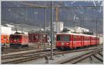 S1 1518 mit Be 4/4 511 und Ge 6/6 II 701  Raetia  in Landquart. (15.03.2011)