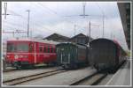 Abgestellter Be 4/4 Pendel, abgestellte Dampfzugwagen und RE nach Davos mit einem Gk am Schluss in Landquart.