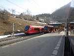 Zwei Capricorns der Rhätischen Bahn in Filisur. Dieses Bild wurde 
bei der Einfahet drs IR 1121 (vodere Lok Ge 4/4 III 646) im Bhf. Filisur aufgenommen.
Die ABe 4/16 3111 fur später um 0904 als R nach Davos Platz.