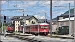  Parkiert  in Samedan, Ge 6/6 II 702  Curia , Vorortspendel mit Stw 1716 und historischer Schneepflug X9103/R.3.