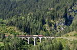 Schweiz: RhB Ge 6/6 II 707 der Rhätischen Bahn auf dem Schmittnerbach Viadukt bei Filisur 29.08.2018