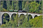 DZ9133 auf dem Schmittentobelviadukt mit Lok G3/4 11  Heidi  als Leerzug ins Depot Samedan.