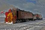 Die Dampfschneeschleuder Xrod d1932 zusammen mit dem Bernina Krokodil G 4/4 Nr.182 in der Station Hospizia Bernina.Bild vom 25.1.2015