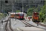 S2 1560 mit ABe 4/16 3104 nach Chur und Tm 2/2 114 in Reichenau-Tamins.