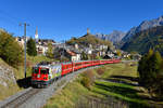 Ge 4/4 II 611 mit einem Regio am 15.10.2017 bei Ardez.