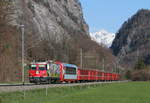 611 mit dem RE 1352 (Samedan-Disentis/Mustér) bei Malans 31.3.19