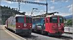 Glacier Express PE902 mit Ge 4/4 II 611  Landquart  überholt in Reichenau-Tamins den GZ 5744 mit Ge 4/4 II 615  Klosters . (05.06.2019)