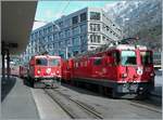 Ge 4/4 I mit Regionalzug 1447 nach Arosa und Ge 4/4 II auf dem Bahnhofplatz von Chur.