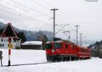 624 der Rhb mit dem RE 1253 (Disentis/Muster-Scuol-Ta rasp) kurz hinter Ilanz (CH) 23.2.09