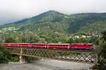 Ge 4/4 II 614  Schiers  am 8. August 2011 mit dem RE 1237 (Disentis/Muster - Scuol-Tarasp) bei Reichenau-Tamins.