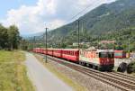 Am 26.Juli 2013 war Ge4/4 II Lok 622 der RhB mit einem Schnellzug aus Richtung Reichenau-Tamins bei Domat/Ems-Emswerk auf dem Weg nach Chur.