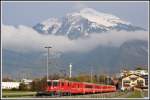 RE1228 nach Disentis mit Ge 4/4 II 631  Untervaz  vor dem schneebedeckten Vilan bei Igis.