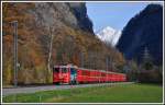 RE1240 mit Ge 4/4 II 615  Klosters   mit der Chlus und dem Chenihorn 2413m im Hintergrund.