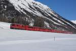 Ge 4/4 II 631 fährt am 09.03.2014 mit dem RE 1929 von Bever Richtung Samedan.