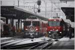 RE1753 mit Ge 4/4 II 620  Zernez  fährt nach Disentis und RE1153 mit der Ge 4/4 III 651  Fideris  nach St.Moritz.