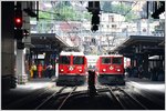 RE 1725 mit Ge 4/4 II 630  Trun  nach Disentis und RE 1125 mit Ge 6/6 II 707  Scuol  vor der Abfahrt in Chur.