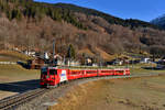 Ge 4/4 II 618 mit einem Engadin Star am 28.12.2016 bei Klosters.