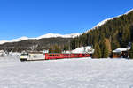 Ge 4/4 III 642 mit einem Regio am 13.01.2018 bei Davos Dorf.