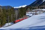 Ge 4/4 III 648 mit einem Regio am 14.02.2017 bei Filisur.