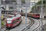 S2 1564 nach Chur mit ABe 4/16 3101 und 58151 mit Ge 6/6 II 704  Davos  in Reichenau-Tamins.