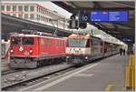 RE1749 mit Ge 6/6 Ii 702  Curia  nach Disentis/Mustér und IR1149 nach St.Moritz mit Ge 4/4 III 641  Naienfeld  in Chur.