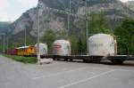 Gterzug aus Samedan (mit wahrscheinlichem Ziel Landquart) bestehend aus Ge 6/6 II 705  Pontresina/Puntraschigna  + BC 110 + 12 weiteren Gterwagen verlt soeben am 1. Mai 2007 den Bahnhof Rothenbrunnen.