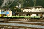 RhB - Skl 8412 am 31.08.2003 in Samedan - Autotransportwagen 4-achsig mit 1 offenen Plattform - Baujahr 1911- SWS/RhB - Gewicht 11,88t - Zuladung 10,00t - LP 16,44m - zulssige Geschwindigkeit 80