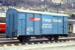 RhB - Gbk-v 5522 am 09.05.1991 in Samedan - Gedeckter Gterwagen 2-achsig mit 1 offenen Plattform CARGO DOMIZIL - Baujahr 1911 - LOUV/RhB - Gewicht 6,58t - Zuladung 12,50t - LP 8,49m - zulssige