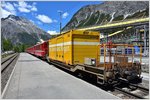 Die Post verkehrt bei jedem Wetter, am Schluss eines Schnellzuges, verladen auf den Sb-t 65658 nach Chur.