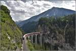 IR1132 nach Chur mit Steuerwagen Ait57803 an der Spitze und Allegra am Schluss auf dem Landwasserviadukt.(10.06.2019)